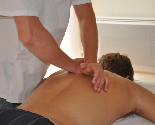 osteopath treating back injury